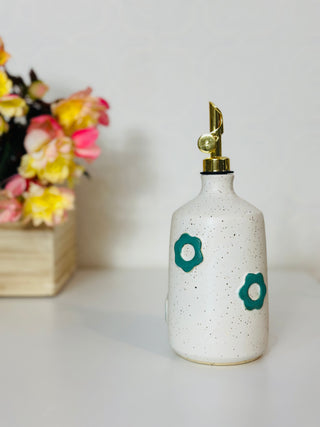 Oil bottle with green flowers