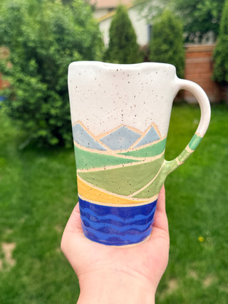 River/mountains travel mug