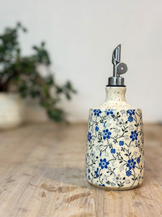 Blue and grey floral oil bottle