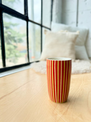 Red with pink and chartreuse Tumbler